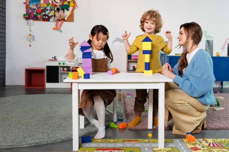 full-shot-kids-playing-with-wooden-shapes-1-1